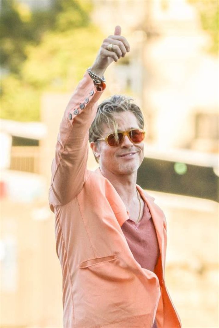
Brad Pitt Rocks An All-Orange Ensemble For ‘Bullet Train’ Photo Call In Paris 